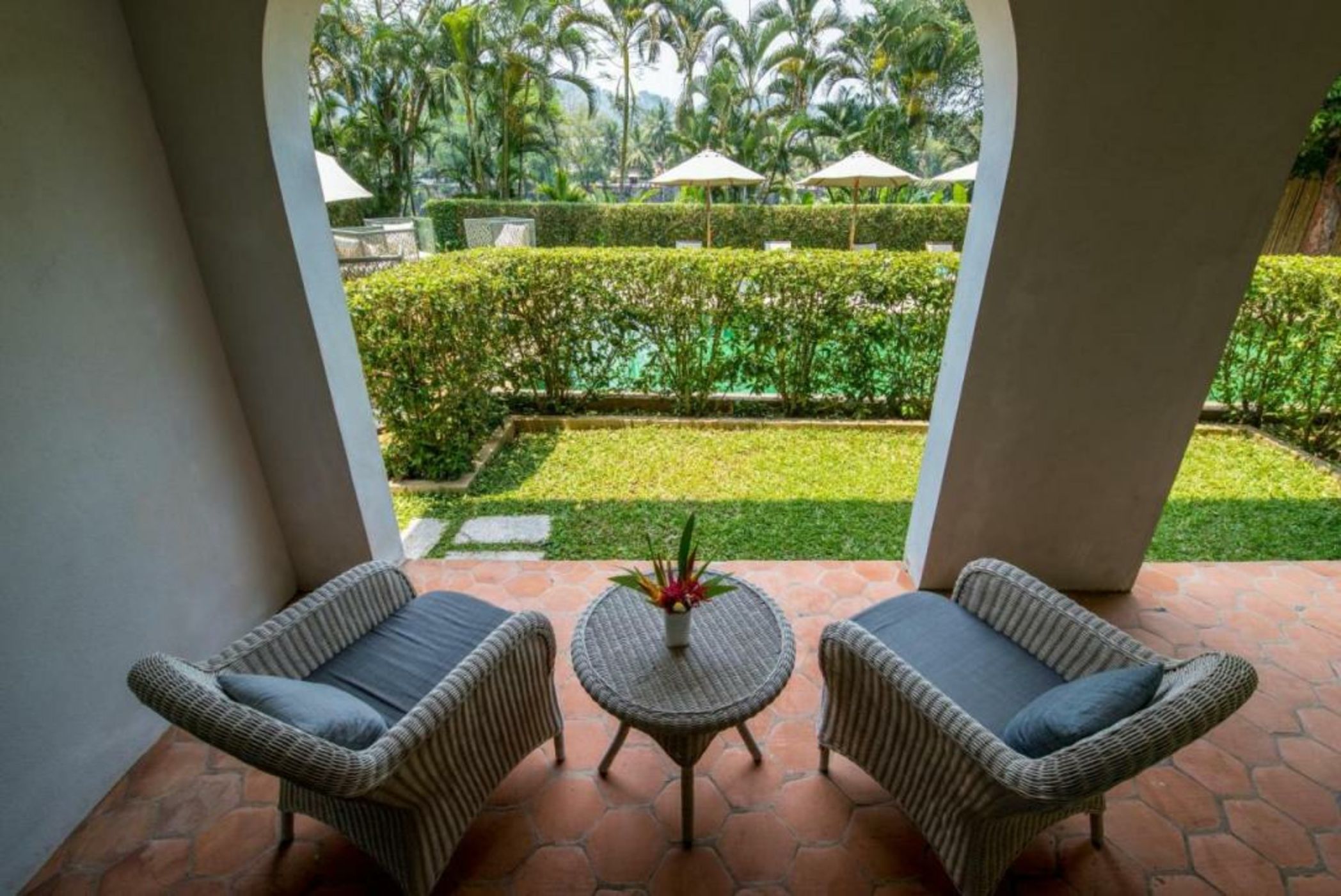 Private terrace with garden and pool view